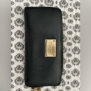 Michael Kor’s wallet